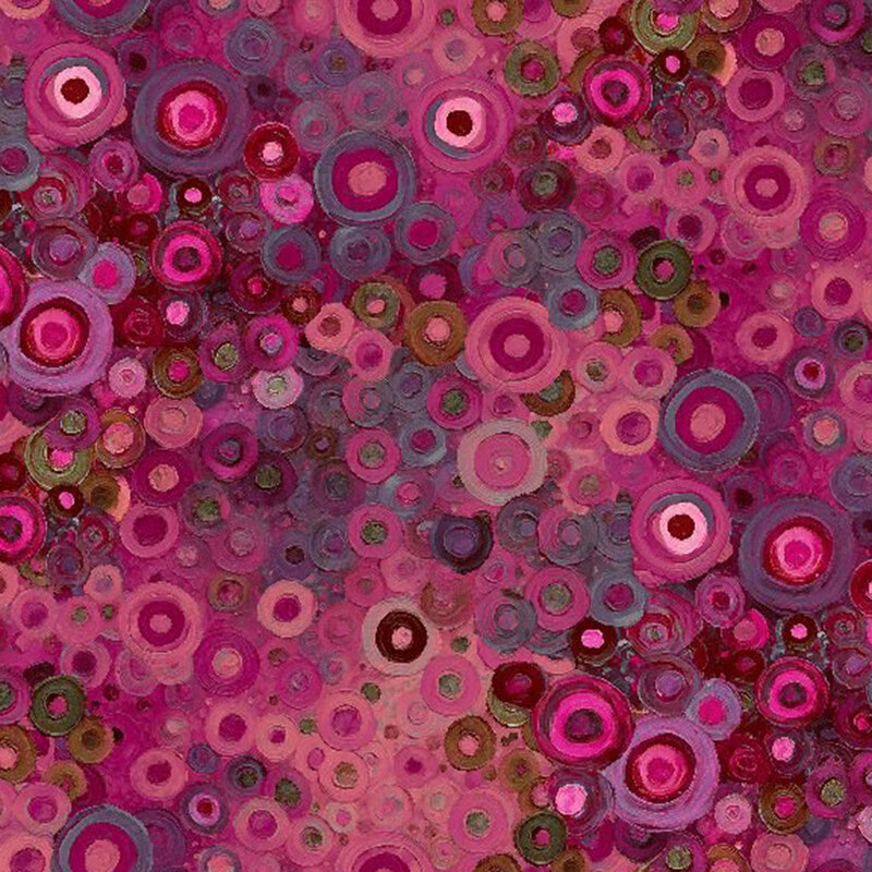 Overlapping multi-colored rings in various hues of pink and purple.