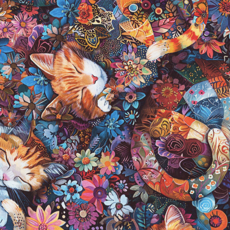 Sleeping calico cats nestled amongst bohemian-inspired flowers.