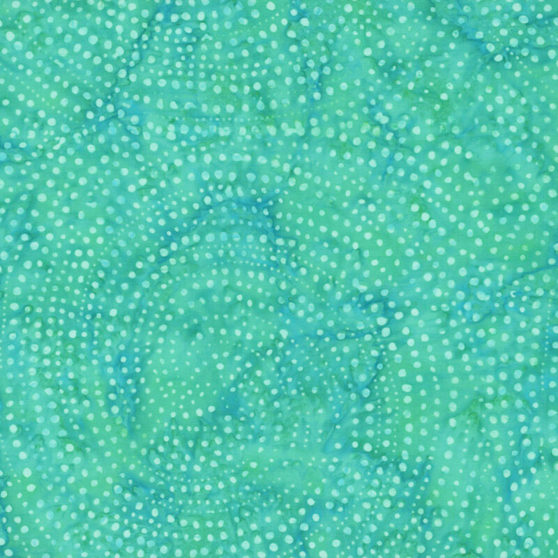 A mottled aquamarine and green fabric with swirls of dots 