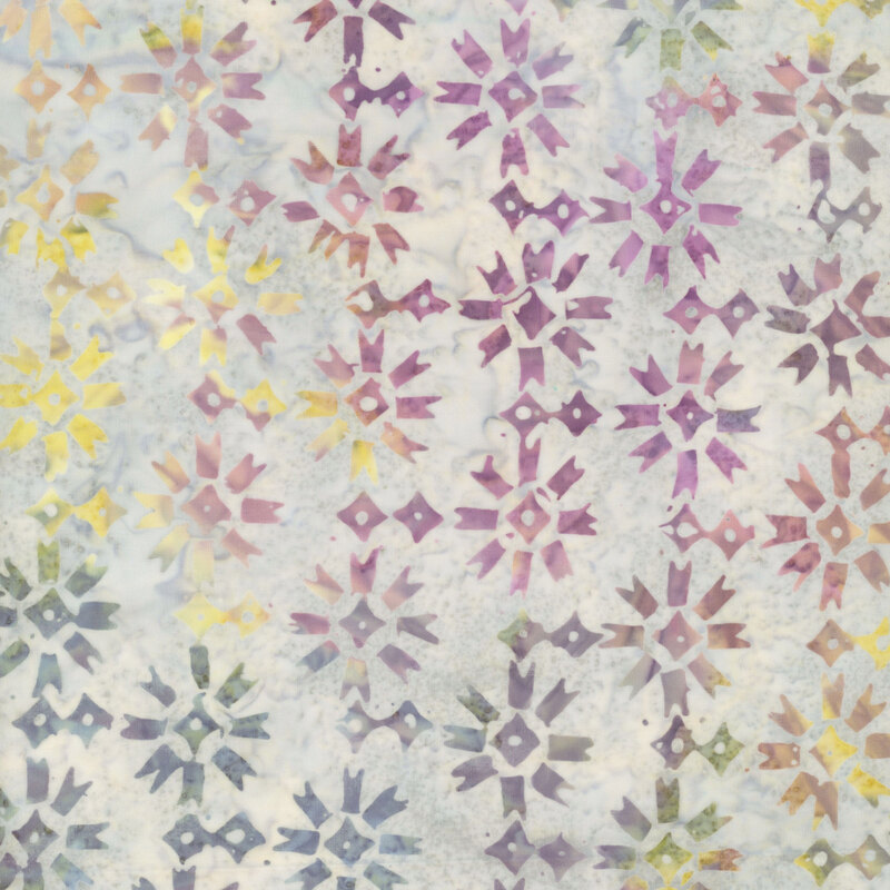 Beige and navy blue mottled fabric with a geometric purple, green and dark blue toned floral pattern