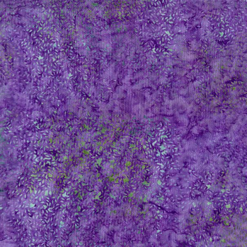 Dark purple watercolor fabric with an abstract green and blue speckled pattern