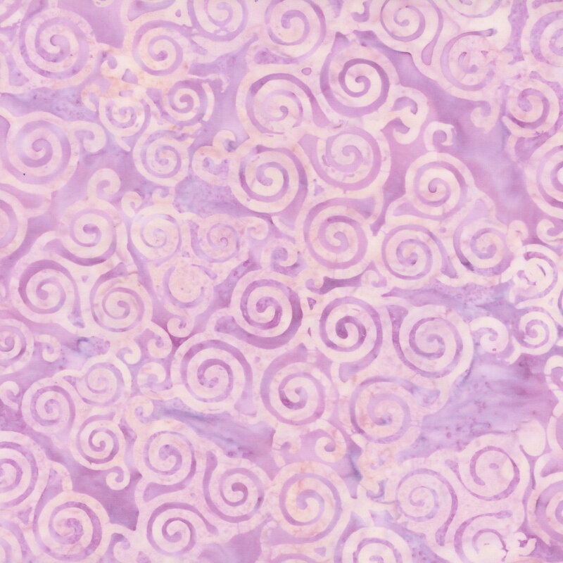 A mottled light purple fabric with layers of tonal tri-swirls
