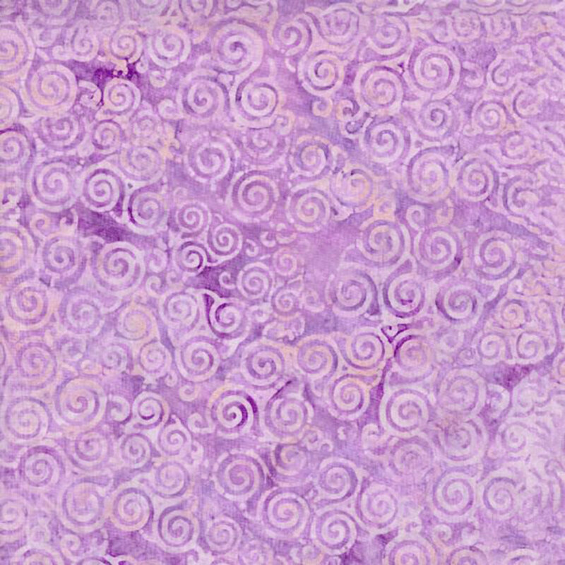 A mottled light purple fabric with layers of tonal tri-swirls