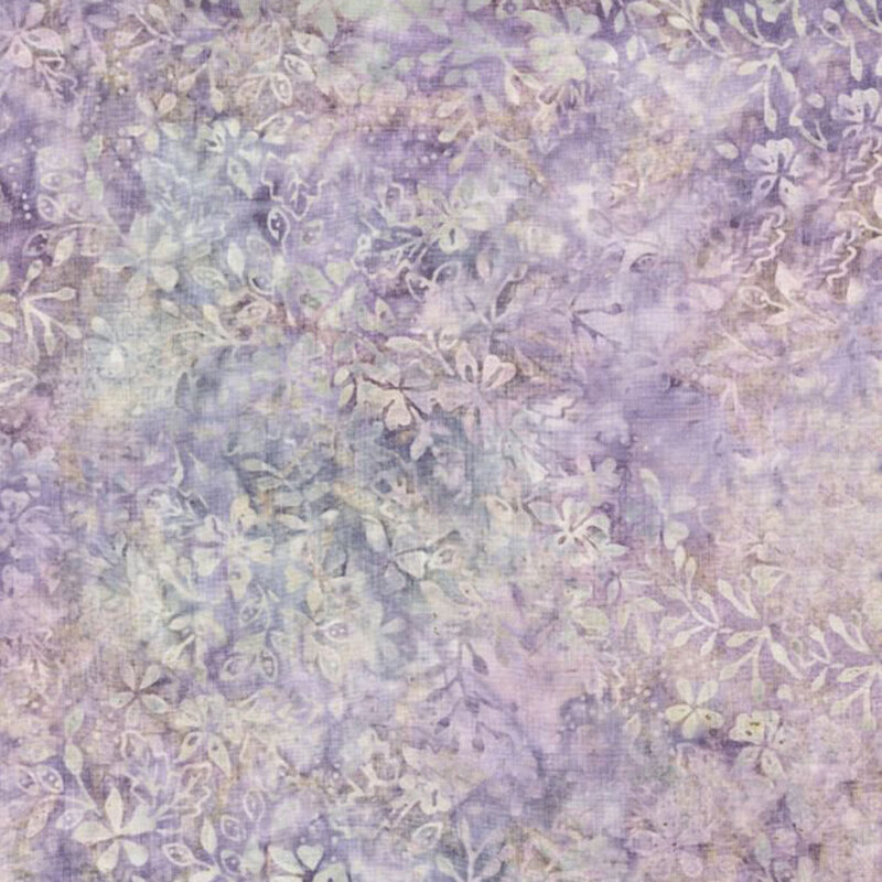 Dusty purple watercolor fabric with violet splotches and a pattern of tonal florals and leaves