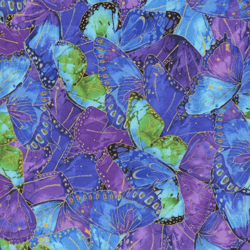 Fabric with dense pattern of iridescent butterfly wings with golden accents.