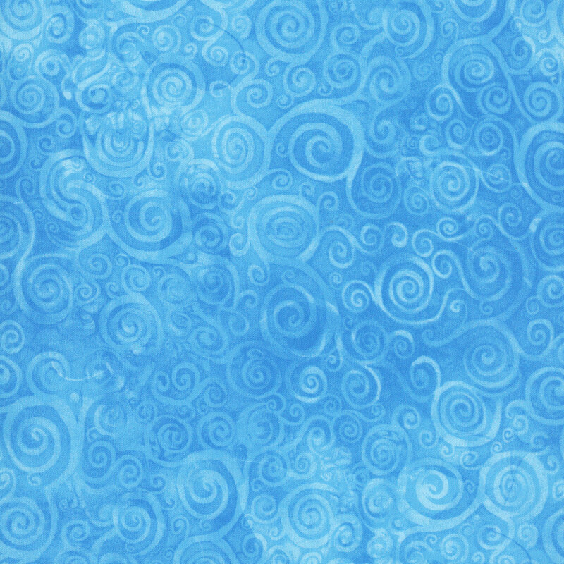 A mottled blue fabric with swirls. 