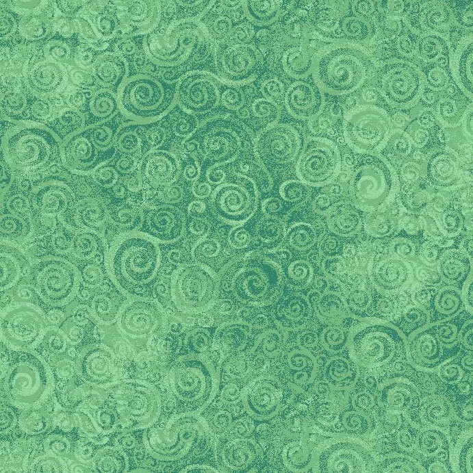 A textured green fabric with swirls. 
