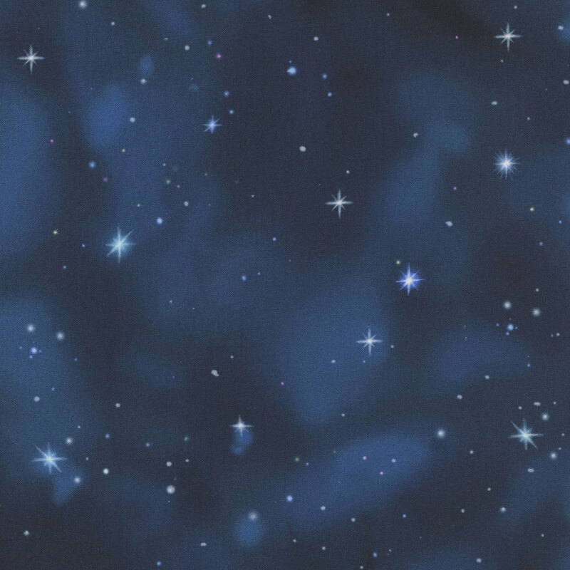 This mottled dark teal fabric features a scene of a night sky with stars. 