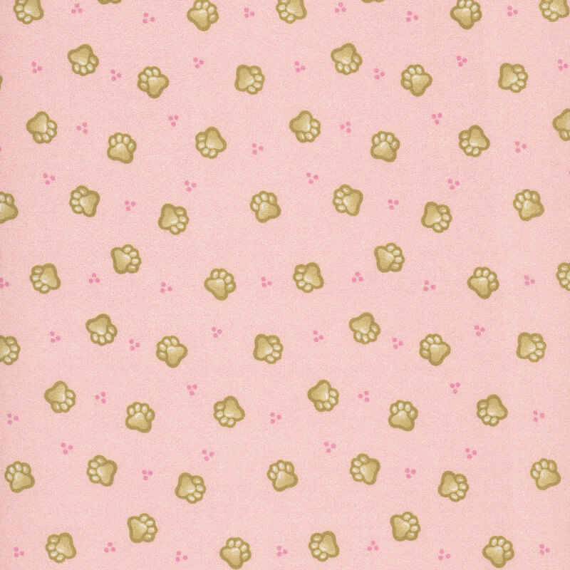 Pastel pink fabric with a ditsy pattern of pink dots and tan cat paws