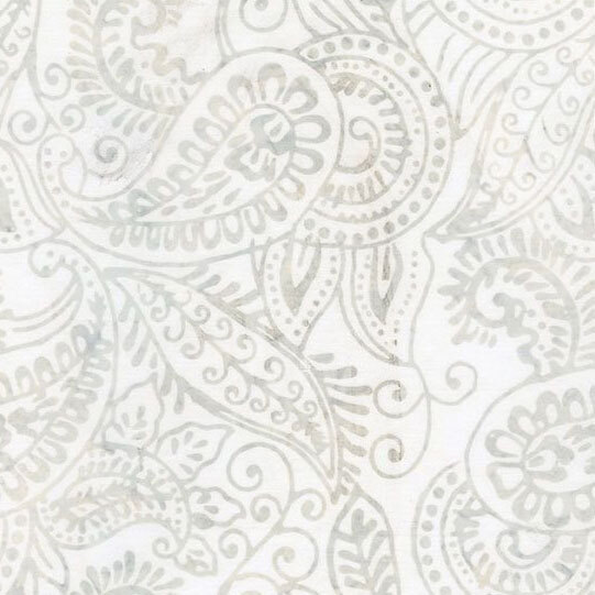 A white batik fabric with light gray paisleys.