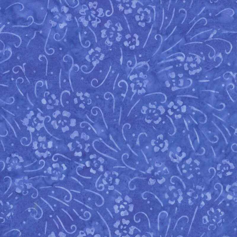 Mottled, royal blue fabric featuring tonal flowers and curling lines.
