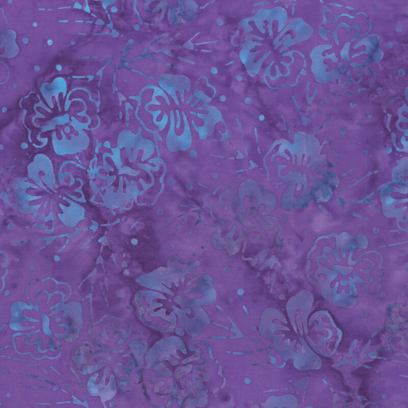 Blue pansy flowers and stems on a mottled dark purple fabric.