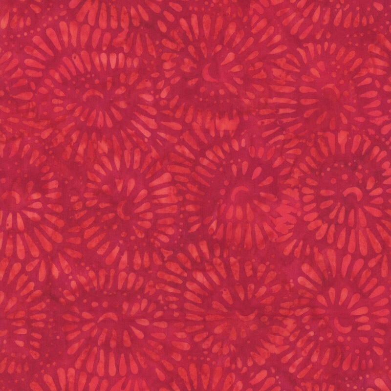 Mottled bright red fabric featuring tonal swirls.