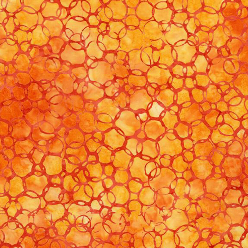 Mottled, bright orange fabric featuring overlapping circles like bubbling lava.