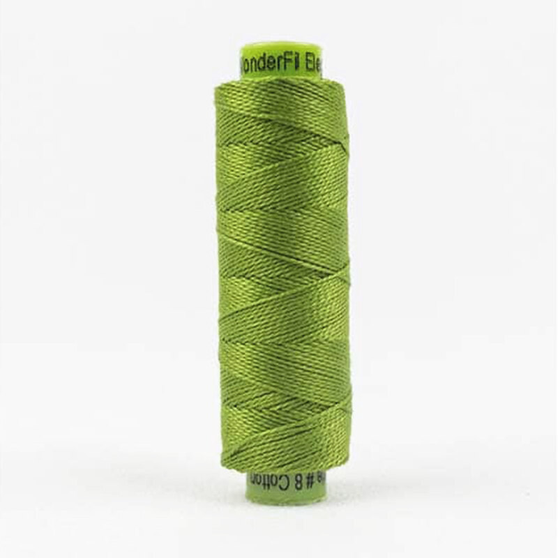 A spool of WonderFil Eleganza #8 EZ34 Tree Frog thread on a white background