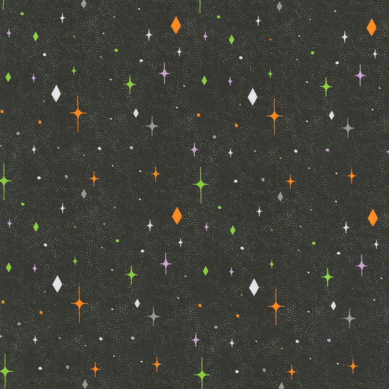 Textured charcoal black fabric with soft gray, purple, orange, and white diamond-shaped stars 