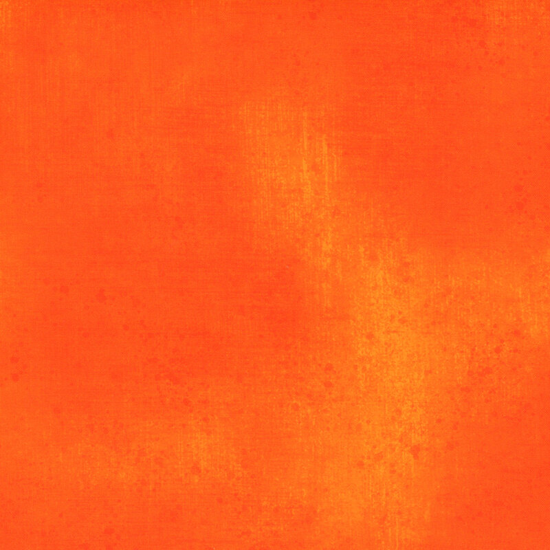 Tangerine orange fabric with a subtle grunge texture.
