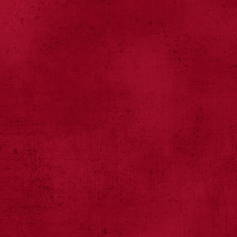 Ruby red fabric with a subtle grunge texture.