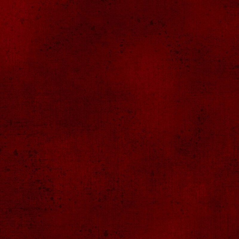 Dark red fabric with a subtle grunge texture.