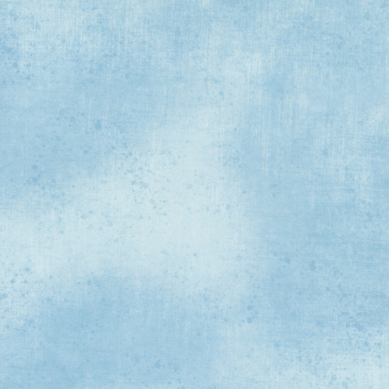 Light denim fabric with a subtle grunge texture.