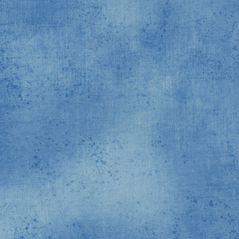 Dark denim fabric with a subtle grunge texture.