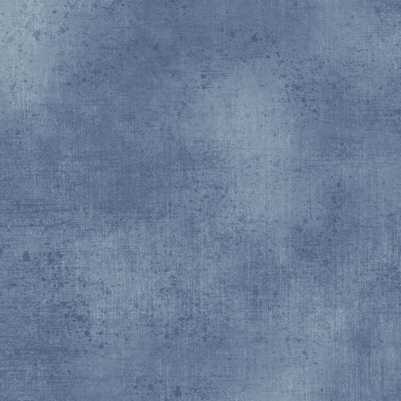 Dark denim fabric with a subtle grunge texture.