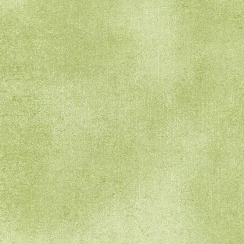 Lemongrass green fabric with a subtle grunge texture
