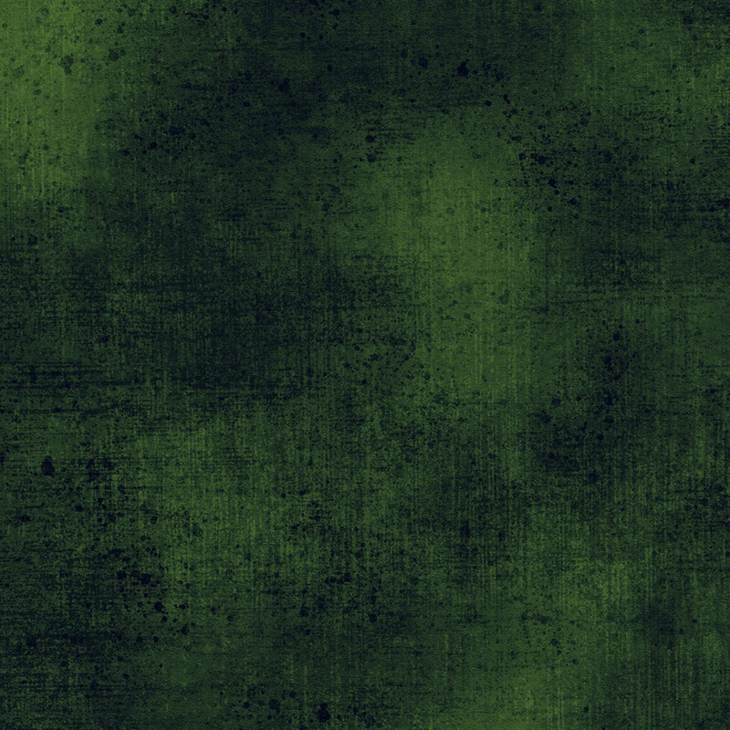 Dark green fabric with a subtle grunge texture.