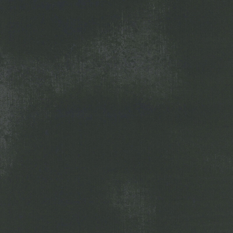 Black fabric with a subtle grunge texture.