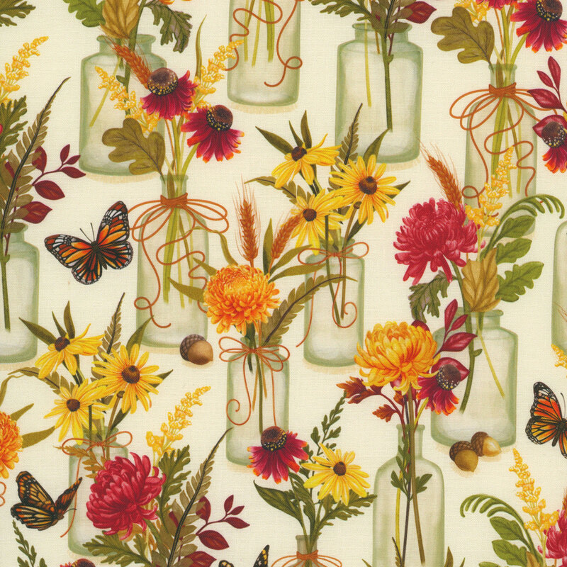 Cream fabric with a pattern of glass vases with bouquets containing yellow and red chrysanthemums, yellow daisies, wheat, and ferns along with monarch butterflies and acorns