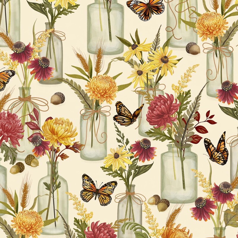 Cream fabric with a pattern of glass vases with bouquets containing yellow and red chrysanthemums, yellow daisies, wheat, and ferns along with monarch butterflies and acorns