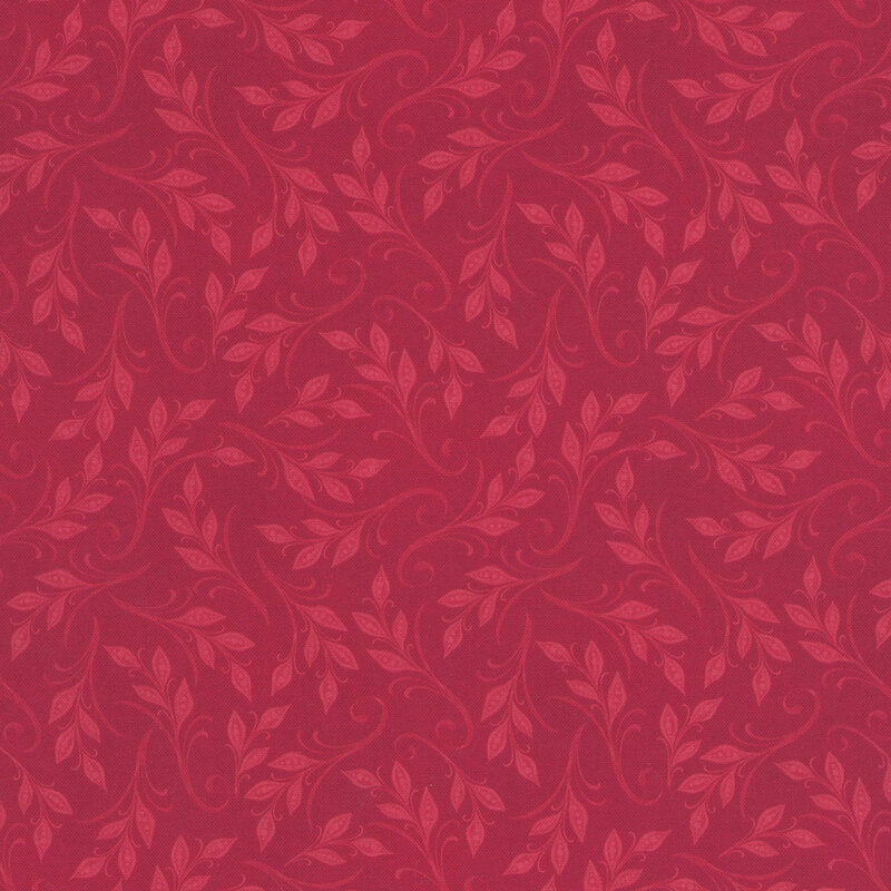 Crimson fabric with swirling, tonal leafy vines 