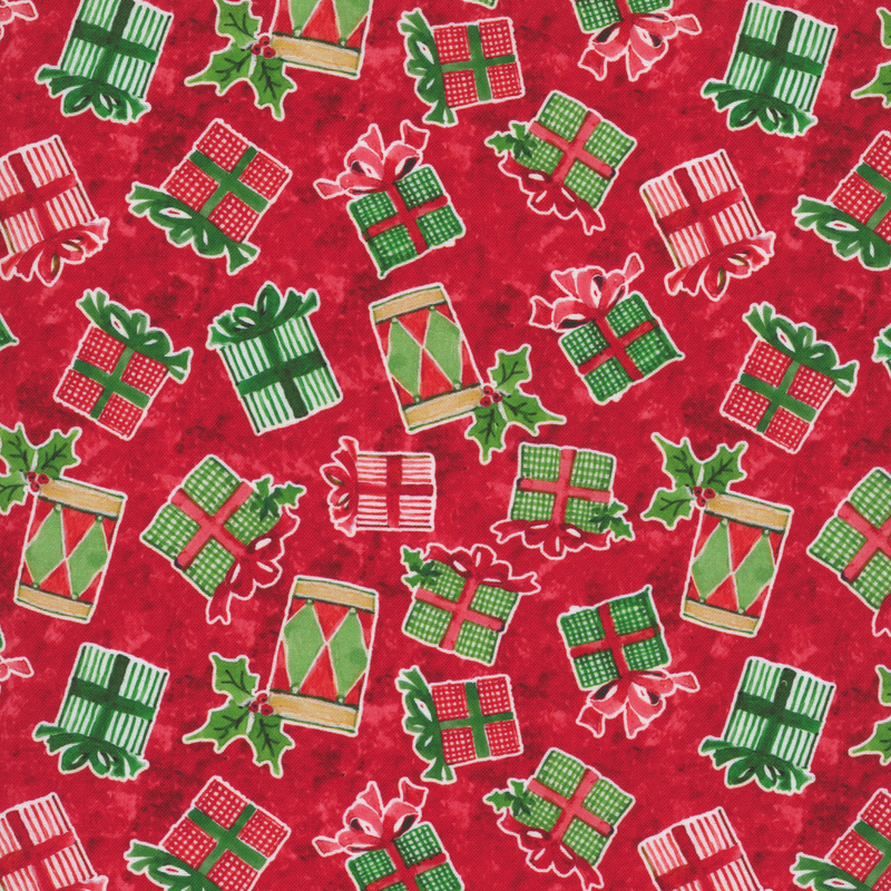 Mottled dark red fabric tossed with vibrantly decorated gifts.