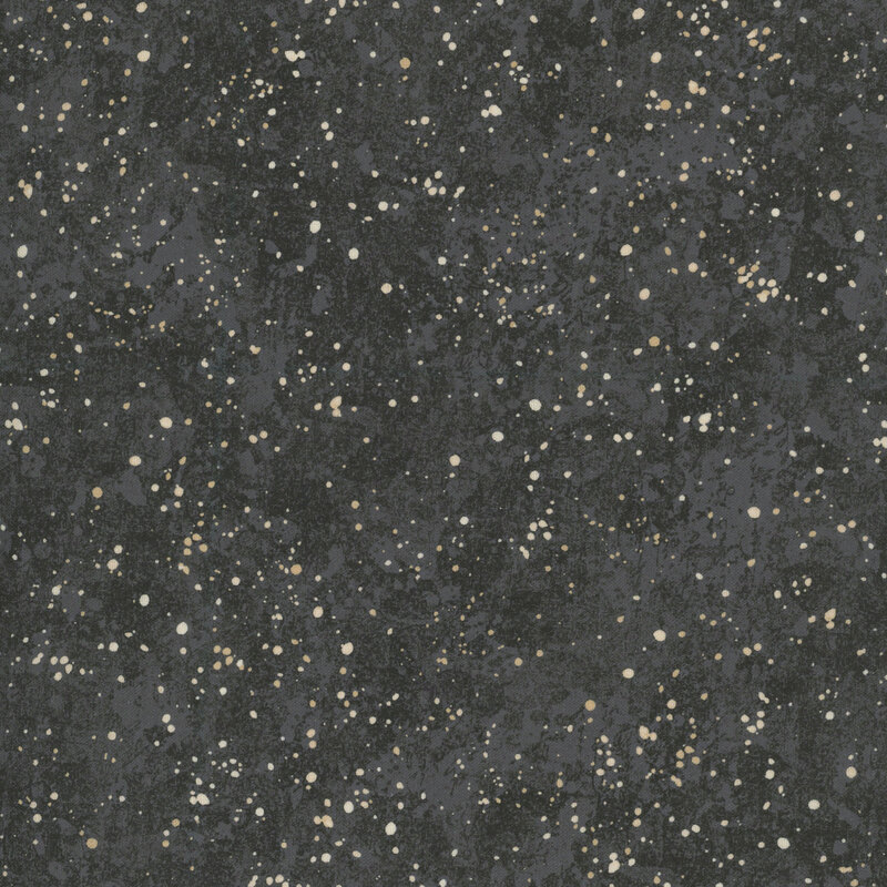 Mottled ebony fabric featuring cream spots resembling paint splatter.