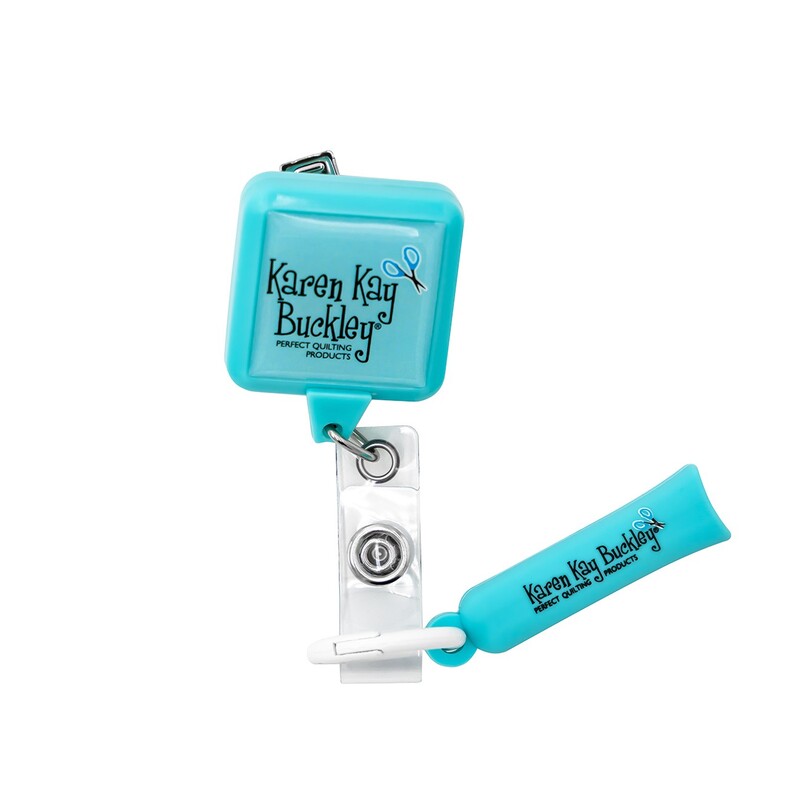 A shot of the Karen Kay Scissor Lanyard out of its packaging, isolated on a white background.