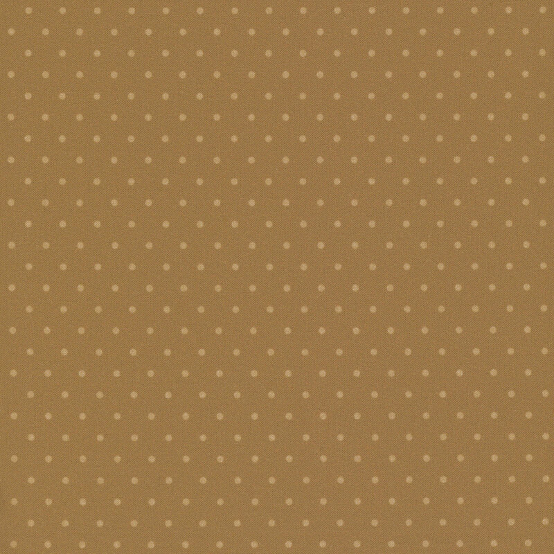 Brown fabric with a tonal polka dot pattern.