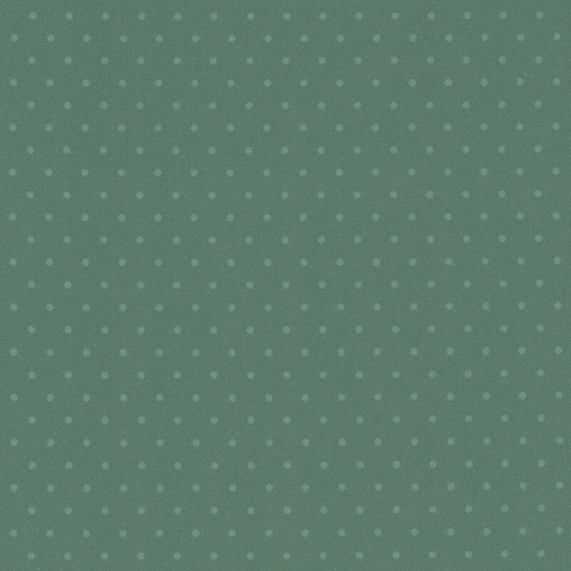 Teal blue fabric with a tonal polka dot pattern.