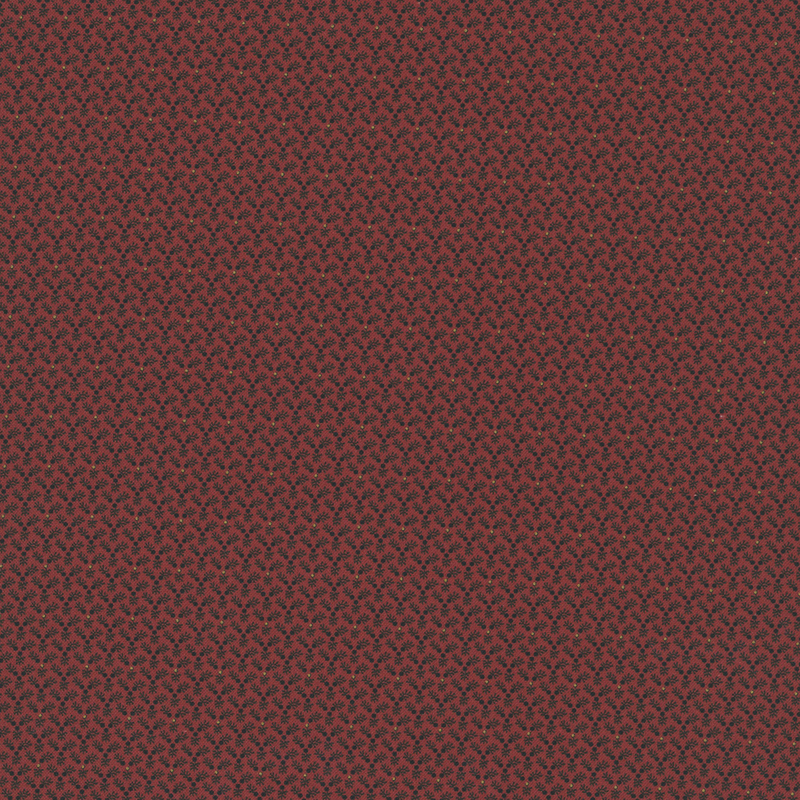 Bright red fabric with a dense primitive pattern of black pine needles and tiny white dots