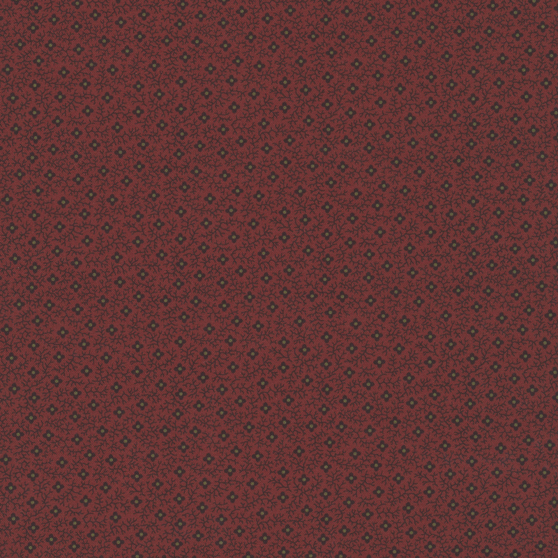 Brick red fabric with a primitive pattern of black and taupe florals and black vines