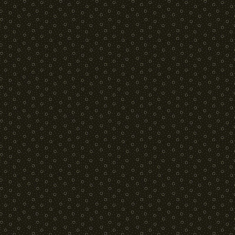 Black fabric with taupe pin dots and crescent shapes with stars