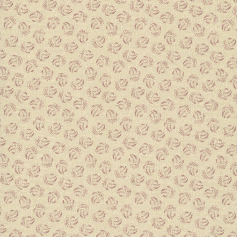 Light beige fabric with a pattern of abstract rose-colored motifs.
