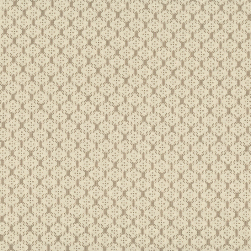 Latte tan fabric with a tonal abstract geometric pattern.