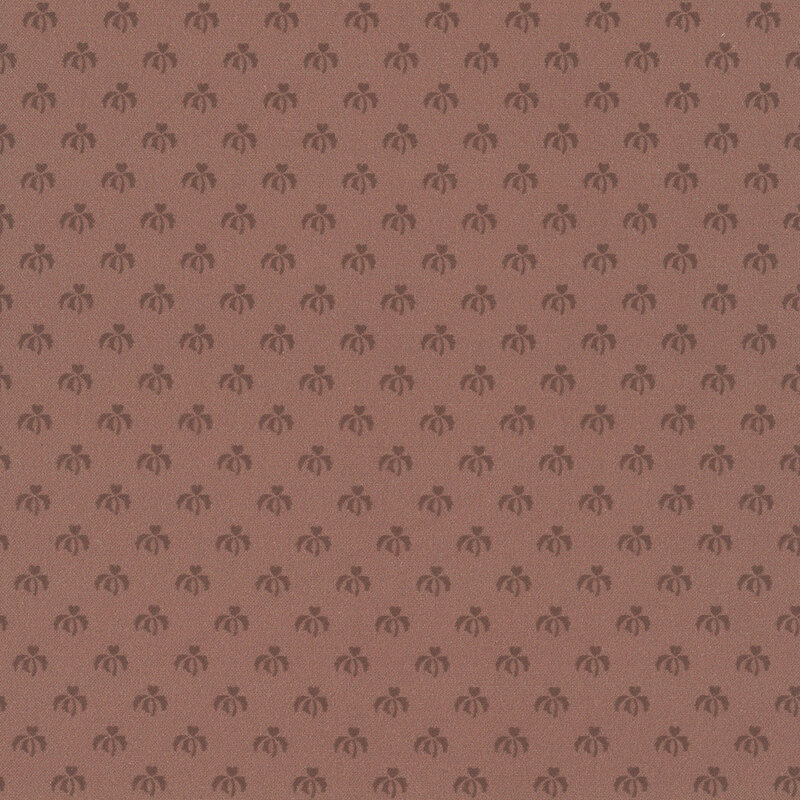 Dark rose fabric with an evenly spaced pattern of tonal, stylized floral designs.