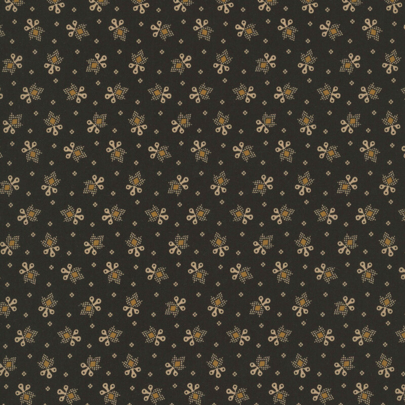 Black fabric with a ditsy primitive floral motif and diamonds in gold 