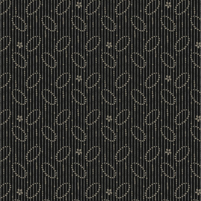 Black fabric with gray dotted vertical lines, ovals, and flowers in a primitive print