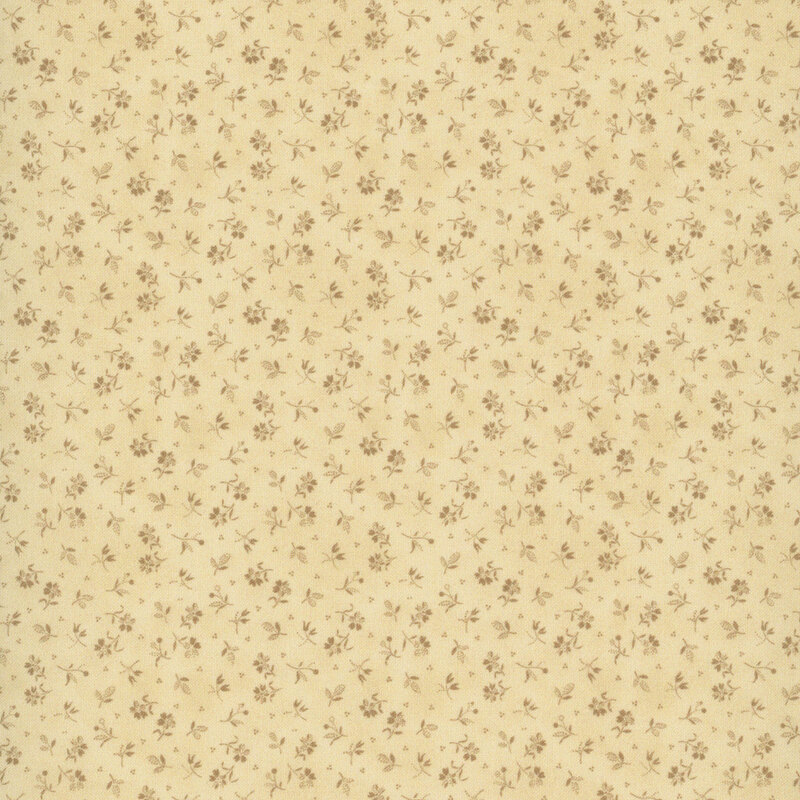 Mottled cream beige fabric with a delicate tossed floral design