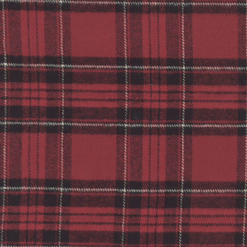Deep crimson fabric with black and cream tartan plaid