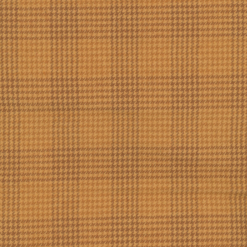 Tonal gold houndstooth check fabric