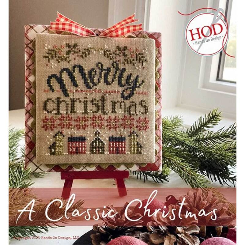 Front of pattern showing the completed cross stitch designs displayed on a white wooden slatted background with coordinating decor.