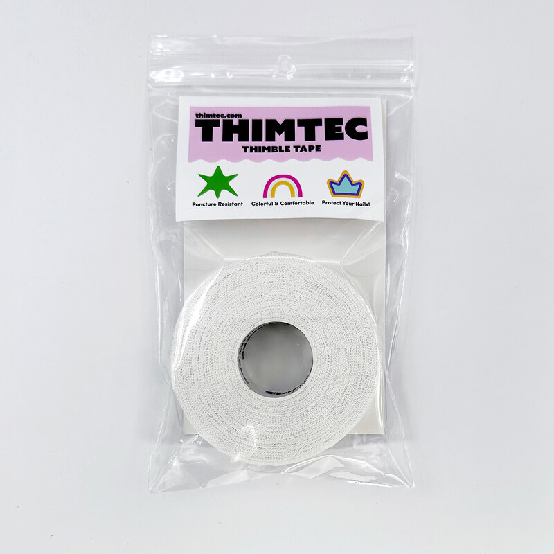 A roll of White Thimtech Thimble Tape in its packaging.